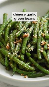 Transform your dinner table with this delightful dish of savory garlic-infused green beans, inspired by traditional Chinese flavors. These vibrant green beans are perfectly sautéed with aromatic garlic, creating a mouthwatering side dish that's both healthy and delicious. Perfect for family dinners or entertaining guests, this recipe adds a touch of elegance and a burst of flavor to any meal. Enjoy the simplicity and richness of Chinese cuisine with every bite.