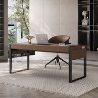 17 Stories Alliant parfaitement style de vie sophistiqué et efficacité au travail, ce bureau d'ordinateur de rangement en cuir de luxe moderne est fait sur mesure pour ceux qui recherchent une qualité supérieure. Conçu avec une efficacité et une fonctionnalité élevées, il est équipé de prises de courant pratiques pour organiser votre espace de travail. Les pochettes de rangement latérales offrent un espace supplémentaire pour les articles essentiels, tandis que les pieds en métal robustes assure