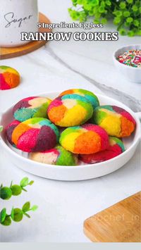 #pridechallenge  Ingredients : 1. Unsalted Butter 1/2 Cup or 100 gm. 2. Castor Sugar 1/3 Cup 3. All Purpose Flour 1 Cup + 2 tbsp 4. Baking Powder 1 tsp 5. Rainbow colours/ Food Colours 1 drop each  Method : 1. In Bowl add Butter and Sugar, whisk together until it's Light & Fluffy. 2. Add Flour & Baking Powder and mix well to form a dough. If dough is too Crumbly and no assembly or form Dough, add 2 to 3 tbsp Milk.  3. Divide the Dough into 6 to 7 equal parts and add the food colour of your choice. 4. Colour each dough with a different Colour. now keep it in Fridge for 15 minutes. 5. Form very small balls of each colour dough and assemble it as shown in the video in flower shape.  6. Then combine the dough to make a Cookie shape. 7. Bake these at 180° C for 12 to 15 minutes .