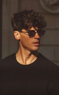 Discover the top 30 medium curly hairstyles for men at Heartafact.com. Explore various styles, including curly mullets, aesthetic cuts, fancy black curly hairstyles, comma cuts, and taper fades. Whether you have long, medium, or short curly hair, find the perfect look for 3a, 3b, and other curl types. Get inspired with #curlyhairmen #curlytaperfade #hairinspo #menshairstyles #curlyhairstylesformen