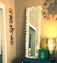 Did my own DIY mirrors this one I used 1$ flower packs at the dollar tree and a 5$ mirror from Walmart