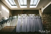 Wedding photography at Trevenna Barns Cornwall. Bridesmaid dress shot. wedding detail shots ideas. Dress photo ideas. Lilac bridesmaid dresses.