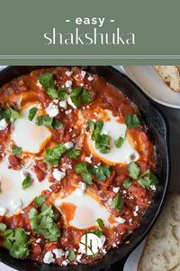 Made with poached eggs in a spicy tomato sauce, this quick and easy shakshuka recipe with feta works well for breakfast, lunch, or dinner.