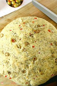 No-Knead Skillet Olive Bread! It's a super easy to make, crusty, homemade bread packed with olives and herbs