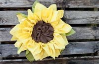 Have you wanted to try your hand at making a burlap wreath for awhile but haven't worked up the nerves yet? Or maybe you've conquered the burlap wreath and want to give it a new twist? No worries! I'm sharing with you an in-depth tutorial to help you make your own burlap sunflower wreath.