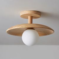 The base is crafted from wood with a natural wood finish that blends in with modern and rustic aesthetics, giving a soothing ambient glow to your surroundings. Its means it's ideal for super-low ceilings and spaces you want to make look more open, so it's great for entryways, hallways, and living rooms.