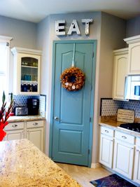 Painted pantry door $10 project. Benjamin Moore Azores paint color. Idea- Paint pantry door at the cabin