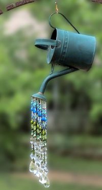 Hey, I found this really awesome Etsy listing at https://www.etsy.com/listing/472063978/watering-can-sun-catcher-sun-catcher