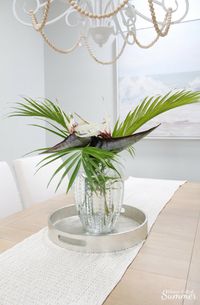 Loveliest Looks of Summer Tour | Fresh & Breezy Summer Style - coastal home decor for summertime, summer outfit ideas, ruffle top, tassel earrings, living room decor, dining room decor, tropical greenery, decor on a budget, free ways to decorate, foyer styling, giant bird of paradise