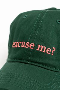 My Accessories London Excuse Me? Baseball Cap in Green Excuse Me where did you get that fantastic hat ?! You'll be looking and feeling good when you can create an effortless and affordable street style like Hailey Bieber and Kendall Jenner with our range of slogan caps. Care: Please Do Not Wash. Wipe Clean. Composition: 85% Cotton 15% Polyester Hardware: Aluminium Sizing: One Size Product Code: AS22HA70