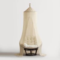 Our flowing Indian Cotton Gauze Sheer Canopy looks unbelievably exotic when draped over a bed, surrounding a papasan chair or shielding an outdoor entertainment area from pesky insects. This cotton gauze canopy in a natural tone is one of those clever items you'll want to keep at-the-ready year 'round.