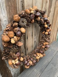 "Rustic Pine Cone Dried Nuts, Natural Woodland Cabinb Lodge Door/Wall Wreath CN69 The time that it took to make this, true appreciation for this piece. This beautiful wreath is made from pinecones, walnuts, chestnuts, hazelnuts, pecans, brazil nuts and filberts. My sister-in-law has one similar and it was made by her great grandmother, passed down...this will last forever! Ready to hang. 18\" in diameter by 3\" deep. Zoom into all pics as this is part of the description. Ask any questions you ha