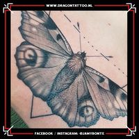 Black and grey butterfly tattoo on the chest. Designed and tattooed by: Jamy Bonte Dragon Tattoo.