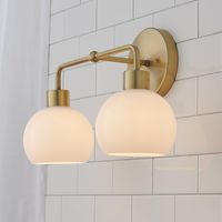 This Young House Love 2-Light Glass Bubble Vanity Light is a new addition to one of our most popular YHL products! Its open glass globe, available in several sleek colors and finishes, makes it a stylish mid-century modern bubble bath sconce choice. We recommend updating a boring bathroom by removing outdated builder light fixtures and mounting this fun vanity light above an existing cabinet.