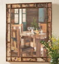 A Black Forest Decor Exclusive - Bring Adirondack style to your room with the handcrafted Adirondack Birch Bark Large Mirror framed in natural birch bark with twig borders. Hook and wire on back for hanging. Measures 29"W x 37"H.