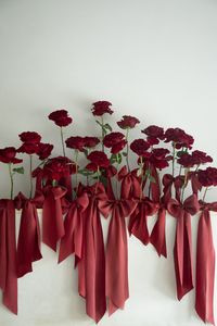 Red silk ribbon bows on roses. Ribbons make every occasion extra special!