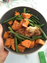 Baked sweet potato cubes with green beans and grilled chicken breast