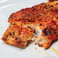 Parmesan-crusted tilapia has a crispy Parmesan coating on a tender and flakey fish fillet. An easy 20-minute weeknight recipe.