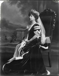 The original owner of the Poltimore tiara, Margaret Harriet, Baroness Poltimore, nee Beaumont, in 1911, wearing her robes and tiara on the occasion of the Coronation of King George V.