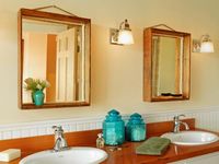 In this simple project, a pair of shallow wood boxes is repurposed into vanity mirror frames.