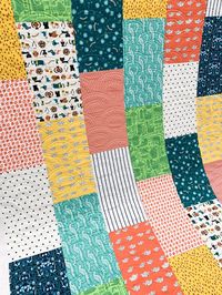 Top US quilting blog, Diary of a Quilter, features an Easy Fat Quarter Quilt tutorial that takes now time to make! Click now for more details!