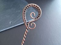 "This beautiful hair stick is made with solid copper wire, twisted, shaped and wrapped just to give you a unique experience. This stick measures 6.5\" in total. The paisley part has 4.5cm x 3cm (1.8\" x 1.2\") and the stick part has 5\" approximately. But if you need one shorter or larger leave the measurement in checkout. All the edges were well smoothed so that it will not harm your hair and skin. All of my items are 100% handmade. Each piece is made in the design shown but, will have slight v