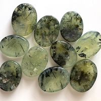 Please note that Prehnite contains natural surface cracks / textures. You'll receive one intuitively chosen stone. Prehnite is a magical stone that enhances prophetic powers and clairvoyance. It encourages you to lead with your heart, allowing you to live authentically and true to self. It is known to connect you with your angels and other spiritual beings. Prehnite is perfect for lightworkers and empaths as it allows you to fully trust your intuition, removing all doubts and second guesses of t