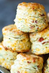 Black Pepper Cheddar Bacon Biscuits - So flaky, fluffy and buttery! With crisp bacon bits, sharp cheddar, black pepper + garlic. These are simply THE BEST!