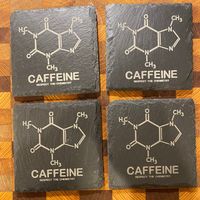 Caffeine Molecule engraved slate coasters. Coasters measure 4x4 inches and include rubber feet. These coasters make a great gift for Weddings, Birthdays, Anniversaries, Housewarming, Christmas, or for your own home! Coasters come in a set of 4. If you have any questions or special requests please send us a conversation through Etsy and we will be glad to help create the perfect item. SPECS: * Set of four slate coasters * Custom laser engraved (permanently etched in the stone) * 4 in x 4 in natur