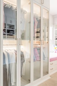 Showcase your whole closet with stunning build-in lighting paired with glass door inserts. Pick out your outfit for the day in a matter of seconds and make getting ready a breeze. Pro tip: Add a drawer or closet sachet to lock in your favorite fragrance and keep your clothes smelling great.