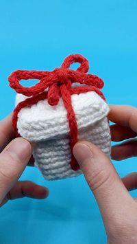 Learn to crochet gift boxes for family and friends using this easy crochet pattern!