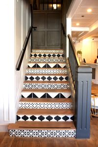 painted black and white geometric patterned stairs at boutique hotel The Landsby in Solvang, CA | theprettycrusades.com (carpet alternative, hardwood floors, Scandinavian design)