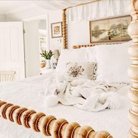 Master Bedroom Canopy Bed with embroidery pillow.