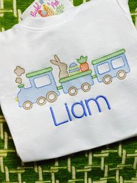 Here comes the Easter Train! All aboard! For a girl ruffle shirt, all the blue will be changed to pink including the name unless otherwise stated. Let me know if you would like a different color for the name/train/egg in the personalization field at checkout. Personalization is optional. This is a unisex shirt. True to size on a white shirt. You can also choose long sleeve or short sleeve and ruffle or plain.