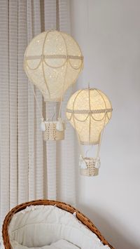 A set of two balloons, large and small, together they look magical! Handmade Hot Air Balloon Lamp - A Unique and Cozy Interior Accent Looking for an original accent piece for your interior? This handmade Hot Air Balloon Lamp will become a stylish and distinctive element in your home decor. Crafted from natural materials like linen yarn, cotton or jute ropes, and linen fabric, this lamp complements a variety of interior styles, from modern to bohemian. Choose Your Light Type and Size This Hot Air