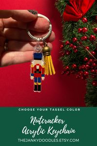 Do you love the Nutcracker or have a ballet fan in your life? This keychain is the gift for you. Available in our etsy store and will ship for Christmas Delivery until 12/14! #stockingstuffers #nutcracker #keychains #christmasgift