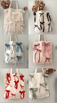 Hi! Welcome to my brand new shop, Valentina Wildy. Im so happy you found me. I'm a mama and a lover of all things sweet and cute! I hope you love shopping with me.  This listing is for one handmade bow tote bag. All bows are hand crafted and hand sewn. The bag measures approximately 12 inches wide x 13 inches long. It's the perfect size! Several bow colors available. Please see all photos for my bow color chart. 🤍Ordering: please include your bow color choice in the personalization section of y