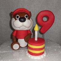 This set includes the beaver, mini cake with candle, and number for age. Made of fondant with wooden skewers inserted for stability and comes from a kitchen that uses nuts. Please try to order at least 2 weeks before your event to allow for ample time to create and ship. Contact me with any special requests or customizations.