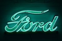 Rare Ford double row neon dealership sign in green, most Ford signs are blue.