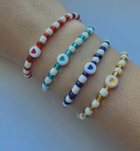 Heart Beaded bracelets for a great price! Handmade with love, these bracelets come in four different colors: red, blue, cyan, and yellow. There are four options to buy, either as a single set for $3.15, a 2-friend set for $5.99,  a 3-friend set for $8.99, or as a 4-friend set for $10.15! If you wish to purchase a double, triple, or quadruple set, then add personalization and type the desired colors in the box. ex: red and yellow