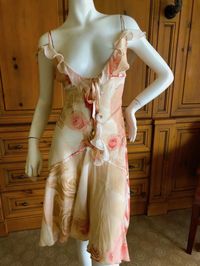 For Sale on 1stDibs - Roberto Cavalli Vintage Floral Silk Low Cut Floral Dress Size Large This is so pretty, please use the zoom feature to see details. Bust 38' Waist 30' Hips