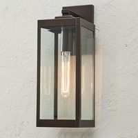 Our Maddox Outdoor Collection will bring lively style to your home's exterior when sporting an urban-modern design.  The lantern figure frames are partnered with beveled glass panes to bring in a transitional detail.  Crafted from sturdy steel, this light will stay strong when hung on your front porch or back patio.