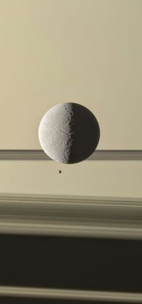 New Cassini Image- Saturn's moon Rhea with the planet's tiny moon Epimetheus.