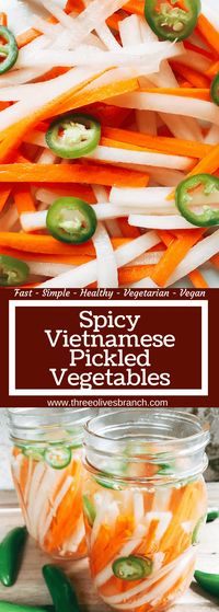 Simple and easy pickled vegetables perfect for your banh mi! Use as a quick condiment on your favorite foods. Daikon radish and carrots are made spicy with serrano. A rice vinegar base is ready in just minutes for this classic Vietnamese slaw. Use cucumber or your favorite vegetables. Vegan and vegetarian. Spicy Vietnamese Pickled Vegetables | Three Olives Branch | www.threeolivesbranch.com #banhmi #pickledvegetables #pickledveggies #vietnameserecipe