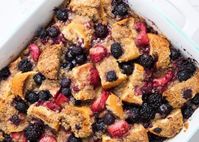 Overnight french toast casserole topped with a brown sugar crumble and berries. A delicious spin on the classic and perfect for holiday gatherings or Sunday brunch!