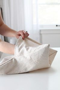 Learn how to make your own envelope pillow covers to save money and add tons of style to your space!  Details at LoveGrowsWild.com