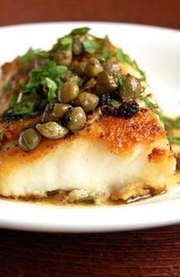 PICCATA-STYLE COD ~~~ the classic cookery method called piccata aka picatta aka pichotta begins with either veal or chicken that is sliced, coated, sauteed, and served in a sauce using pan drippings, lemon juice, white wine and/or stock, shallots, garlic, capers, slices of lemon, and finished off with butter. the dish at this post's link goes for a twist on this classic by using cod. [Italy, NonTraditional] [paleogrubs]