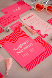 Looking for a Wedding Invite that's a little out of the box? Design your own funky pink Wedding Invite. This unique design is sure to catch the eye of your guests and make a great statement for your special day. Image Credit: With Bells On Invites