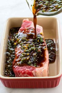 This easy steak marinade recipe is the BEST, and it will quickly add tons of flavor to any cut of beef! The mixture is a blend of soy sauce, Worcestershire sauce, onion, garlic, honey, olive oil, and fresh herbs. #steakmarinade #steak #marinade