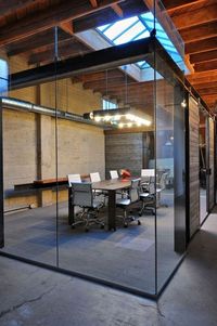 C: All glass is cool but make sure the client is aware their meetings will be in fishbowls. Design is also about functionality / conference rooms / offices /